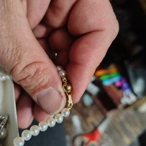 Elegant Gold and White Pearl Necklace